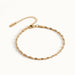 Anchor Twist Chain Bracelet – flat lay with clasp and extender, angled view, gold, on ivory background