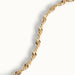 Anchor Twist Chain Bracelet – close-up of the twisted chain, gold, on ivory background