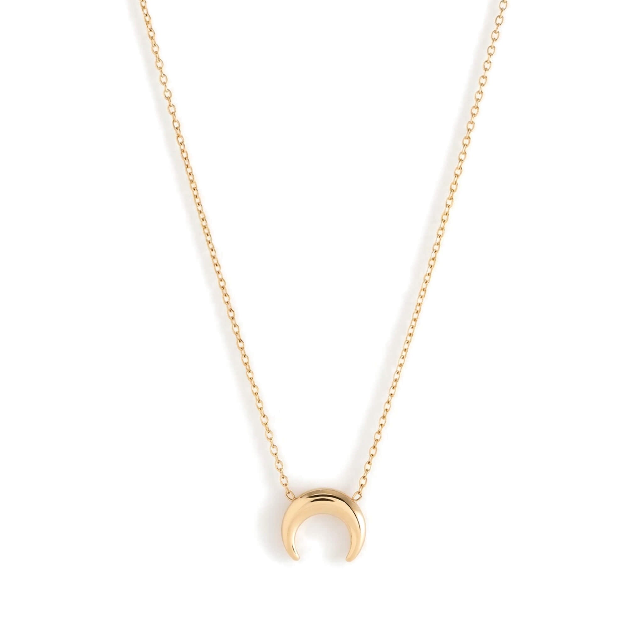 Arc Pendant Necklace – small curved crescent pendant on a fine chain, gold, on white background