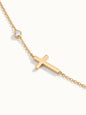 Beside Me Cross Bracelet in gold, close-up of the cross and stone