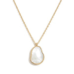 Dawn Pearl Pendant Necklace – irregular mother-of-pearl pendant on a fine chain, gold, on white background