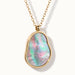 Dawn Pearl Pendant Necklace – close-up of the pendant with pink and green iridescence, gold, on ivory background