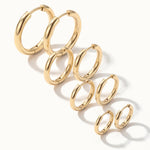 Faithful Hoops – all four sizes in a diagonal line, 12mm to 6mm, gold, on ivory background