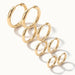 Faithful Hoops – all four sizes in a diagonal line, 12mm to 6mm, gold, on ivory background