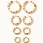 Faithful Hoops – all four sizes lying flat, 12mm to 6mm, gold, on ivory background