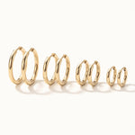 Faithful Hoops – all four sizes standing in a row, 12mm to 6mm, gold, on ivory background