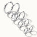 Faithful Hoops – all four sizes in a diagonal line, 12mm to 6mm, silver, on ivory background
