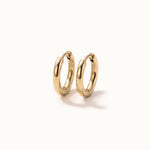 Faithful Hoops – pair of plain polished hoops, 6mm, gold, on ivory background