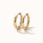 Faithful Hoops – pair of plain polished hoops, 8mm, gold, on ivory background