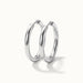 Faithful Hoops – pair of plain polished hoops, 12mm, silver, on ivory background