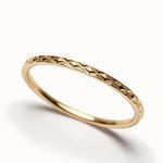 Golden Season Band – close-up of the woven texture, gold, on ivory background