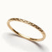 Golden Season Band Ring – close-up of the woven texture, gold, on ivory background