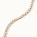 Grace Line Bracelet – close-up of the crystal row, gold, on ivory background