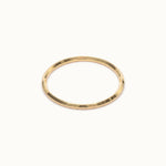 Grace Stack Ring – flat 45° view, gold, on ivory background