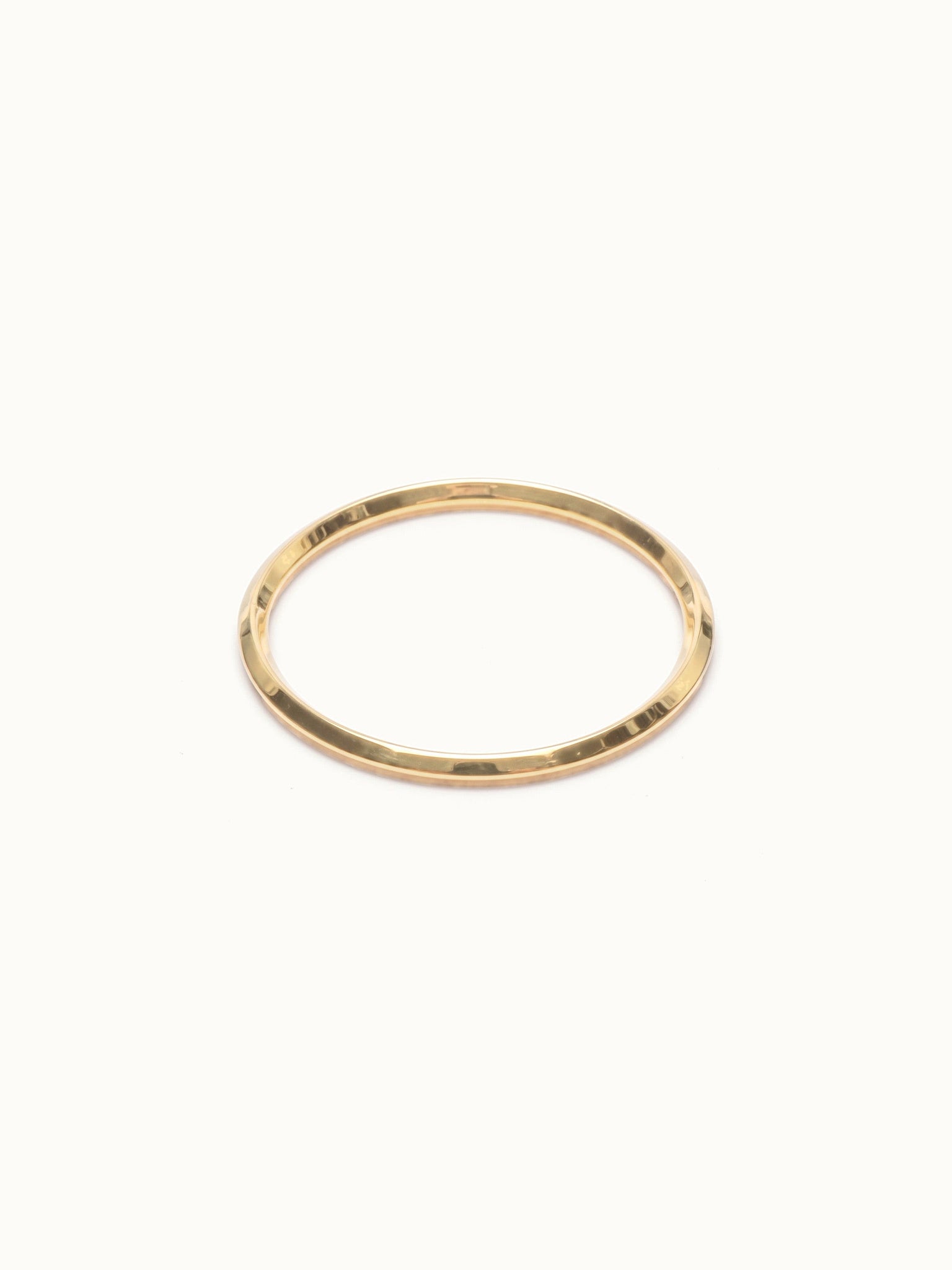 Grace Stack Ring – flat 45° view, gold, on ivory background