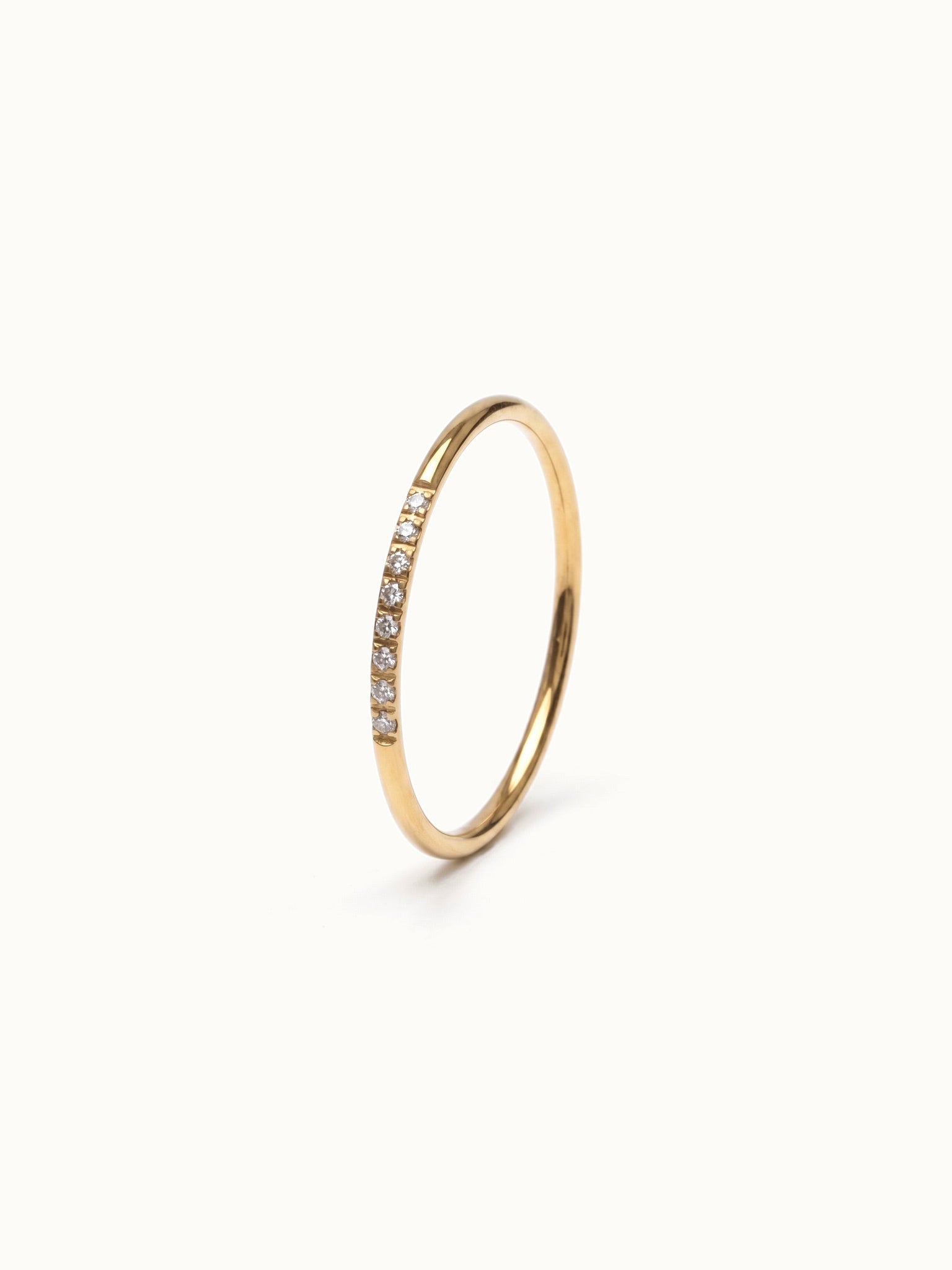 Halo Band Ring 8-stone – 45° view, gold, on ivory background