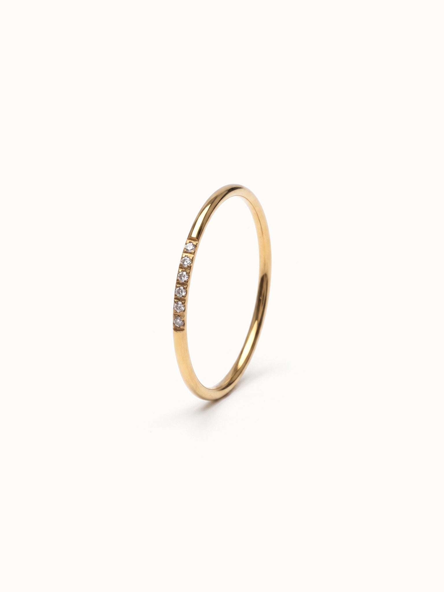 Halo Band Ring 6-stone – 45° view, gold, on ivory background