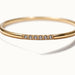 Halo Band Ring 6-stone – close-up detail, gold, on ivory background