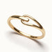 Held Ring – close-up of the soft link, gold, on ivory background