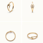 Held Ring – four-angle grid, gold, on ivory background