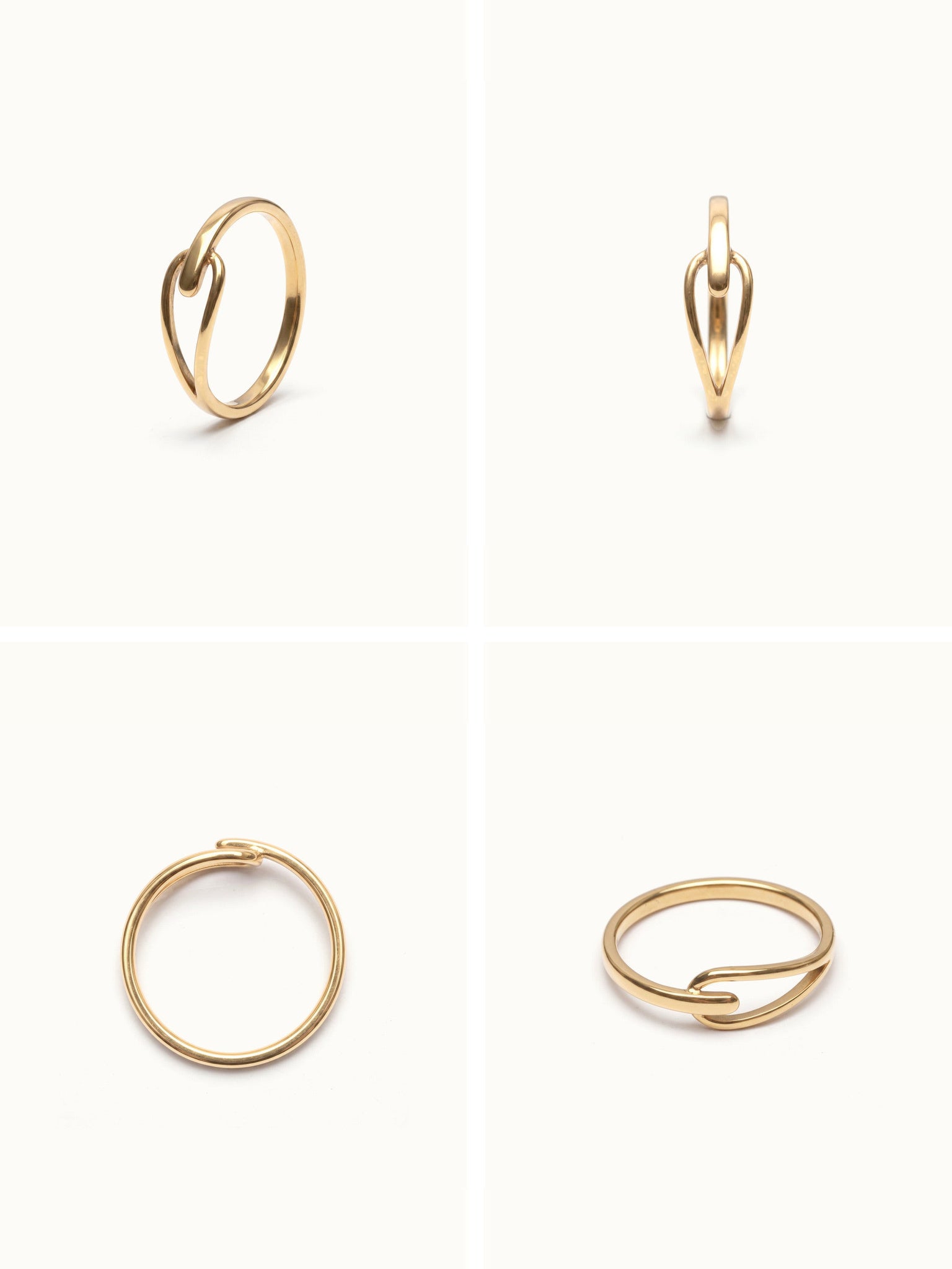 Held Ring – four-angle grid, gold, on ivory background