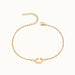 Initial Bracelet – letter C charm on a fine cable chain, gold, on ivory background