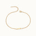 Initial Bracelet – letter I charm on a fine cable chain, gold, on ivory background