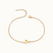 Initial Bracelet – letter Y charm on a fine cable chain, gold, on ivory background