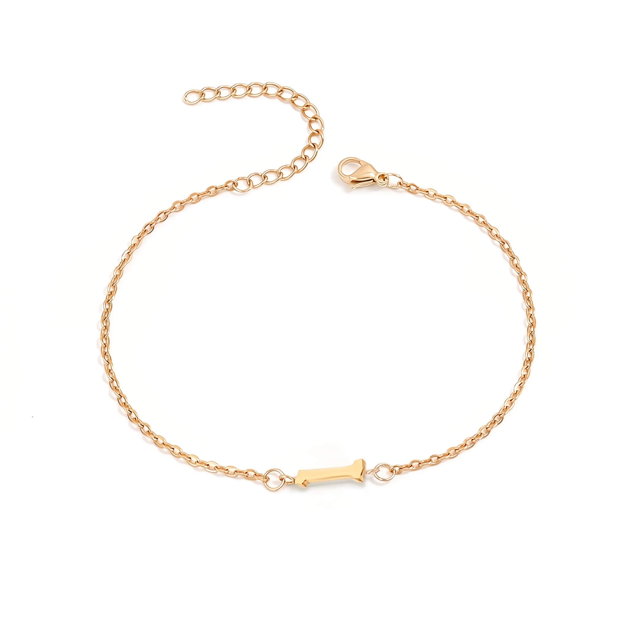 Initial Bracelet in gold with letter I charm, flat lay on white background