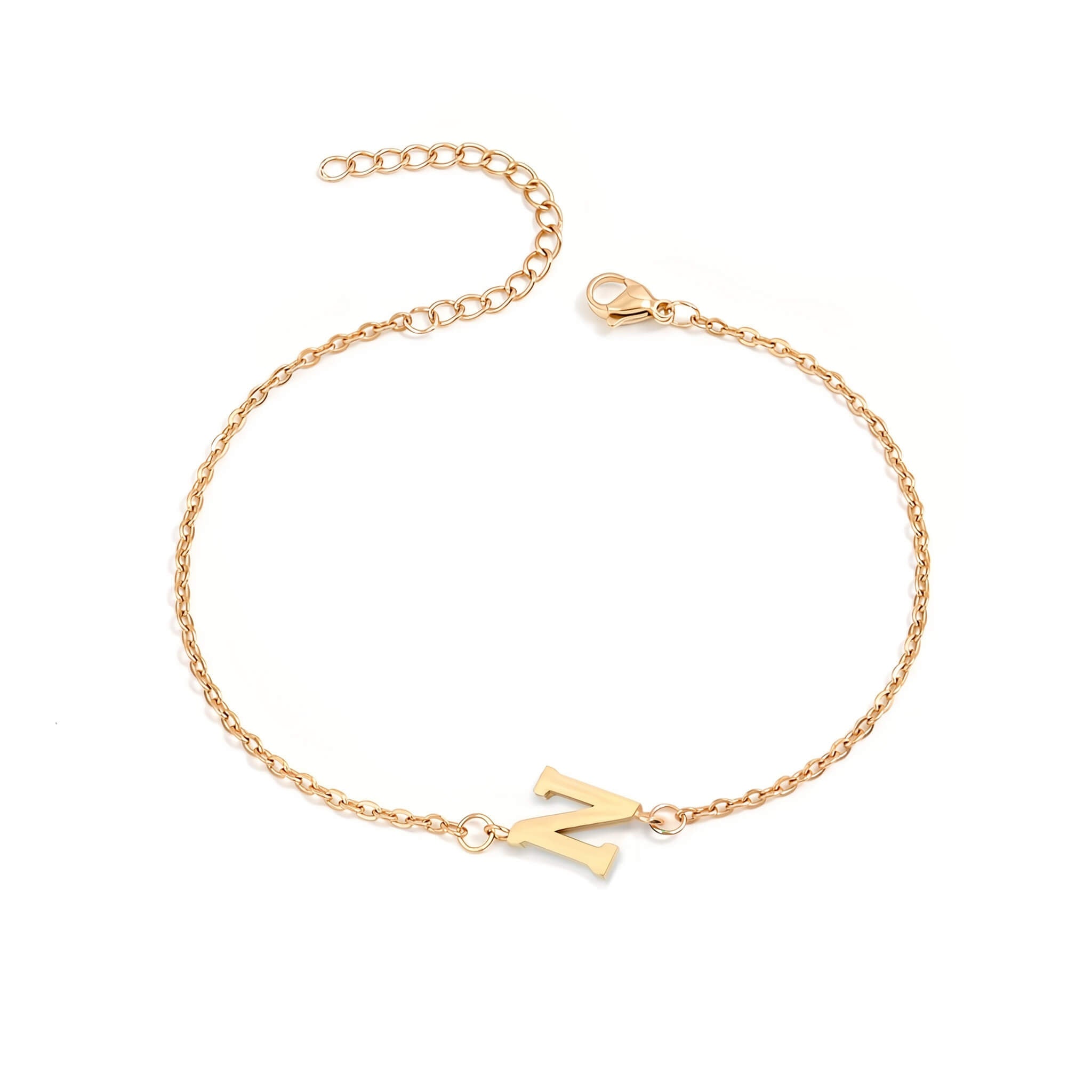 Initial Bracelet in gold with letter N charm, flat lay on white background