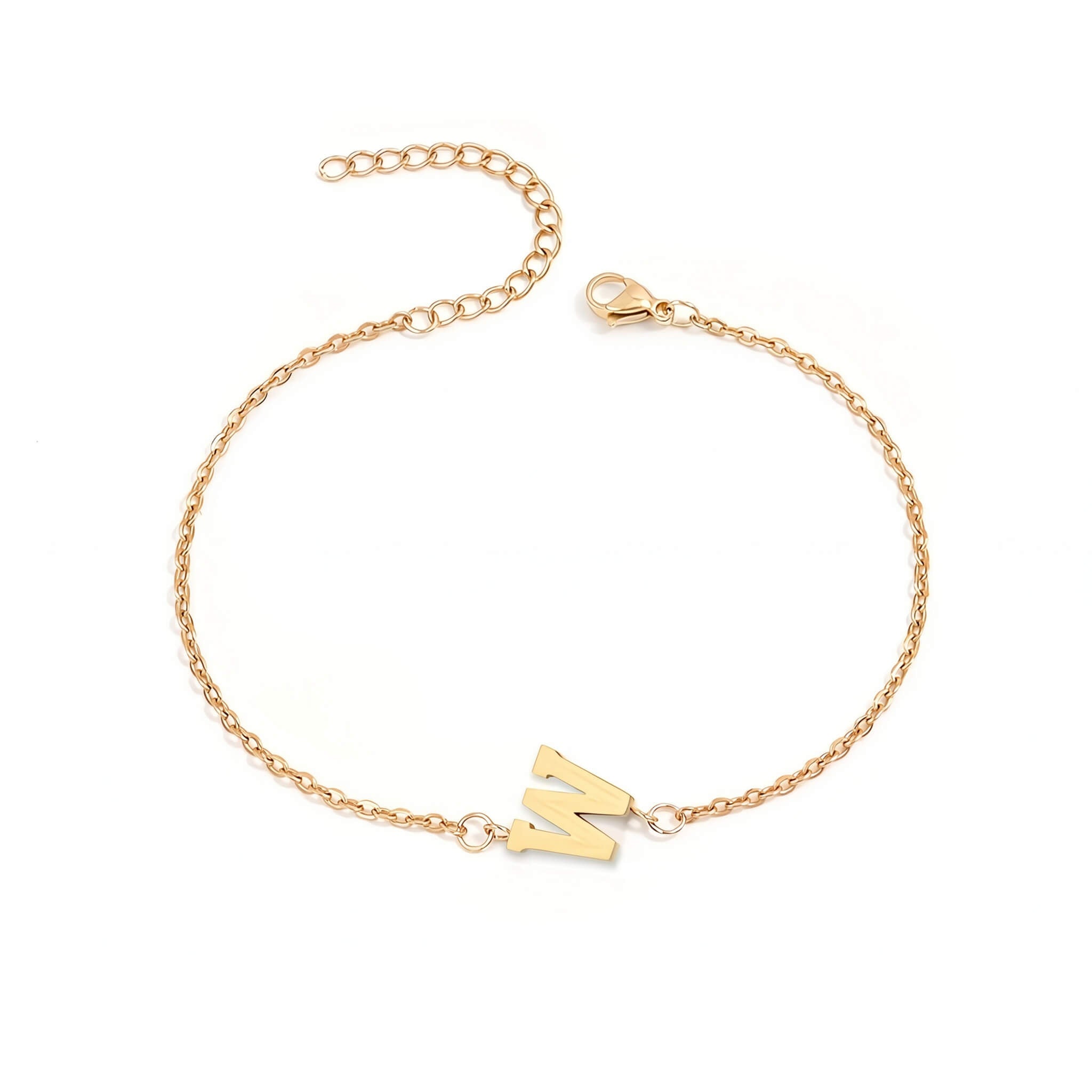 Initial Bracelet in gold with letter W charm, flat lay on white background