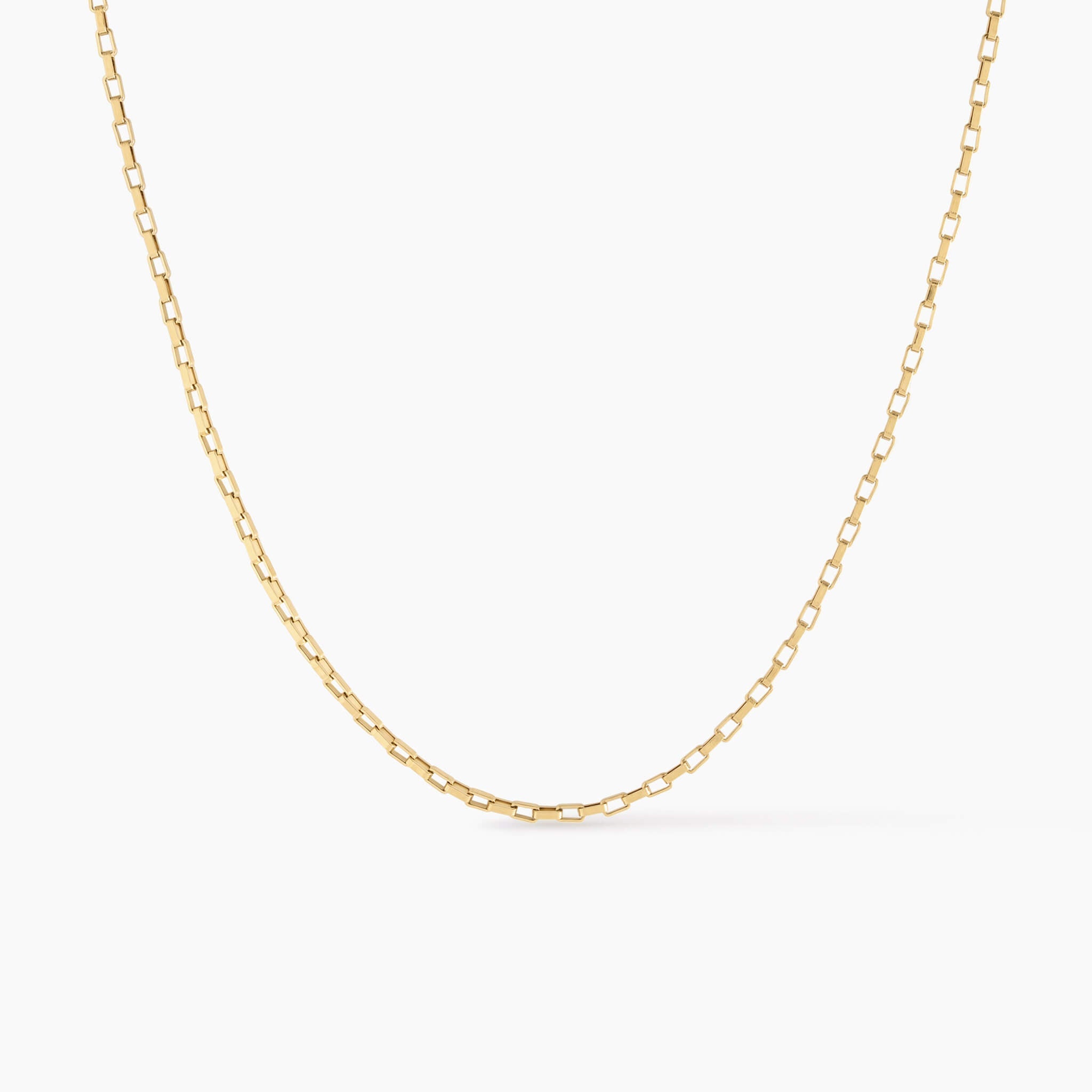 Kindred Link Necklace in gold, close-up of the rectangular box chain links