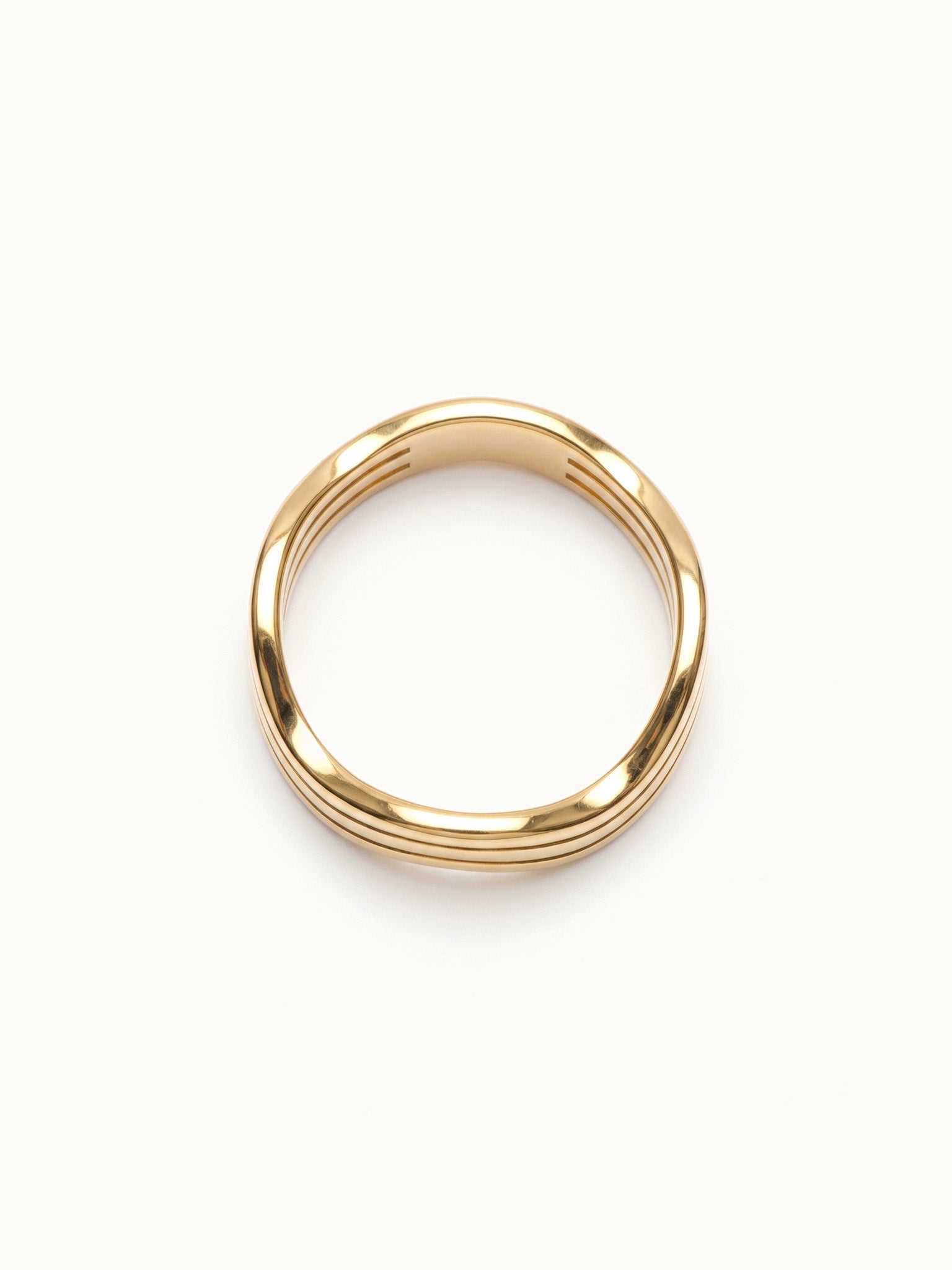 Mercies Ring – side view, gold, on ivory background