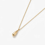 Mercy Teardrop Necklace in gold with a smooth teardrop pendant