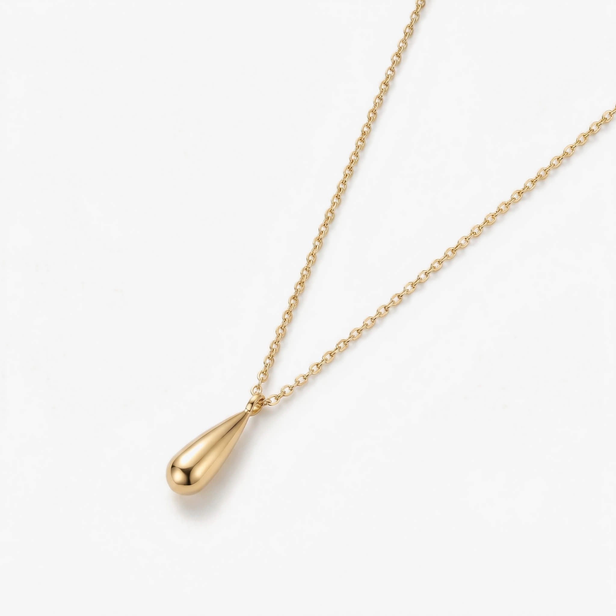 Mercy Teardrop Necklace in gold with a smooth teardrop pendant