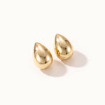 Morning Joy Studs – pair of teardrop studs, gold, on ivory background