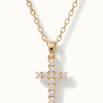 Radiant Cross Necklace in gold, close-up of the stone-set cross
