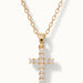 Radiant Cross Necklace in gold, close-up of the stone-set cross