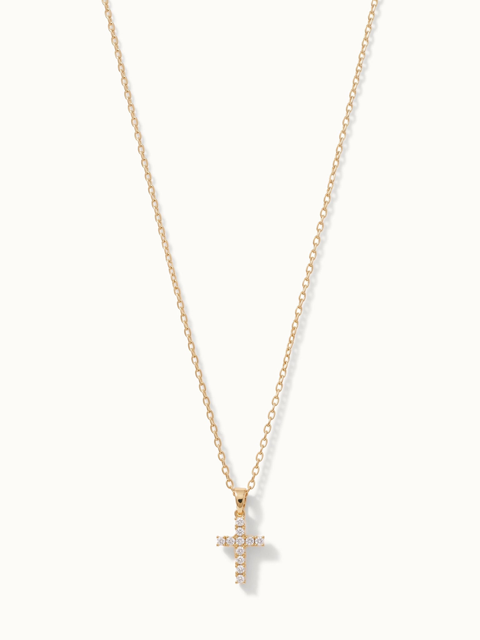 Radiant Cross Necklace in gold, long drop on a fine chain