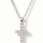 Radiant Cross Necklace in silver, close-up of the stone-set cross