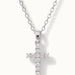 Radiant Cross Necklace in silver, close-up of the stone-set cross