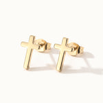 Rooted Cross Studs – pair of cross studs, gold, on ivory background