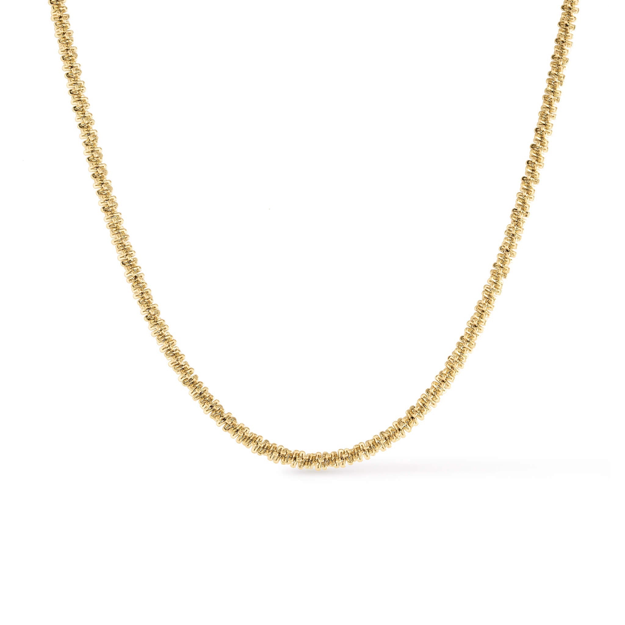 Rooted Rope Chain Necklace – wider rope chain laid in a curve, gold, on white background