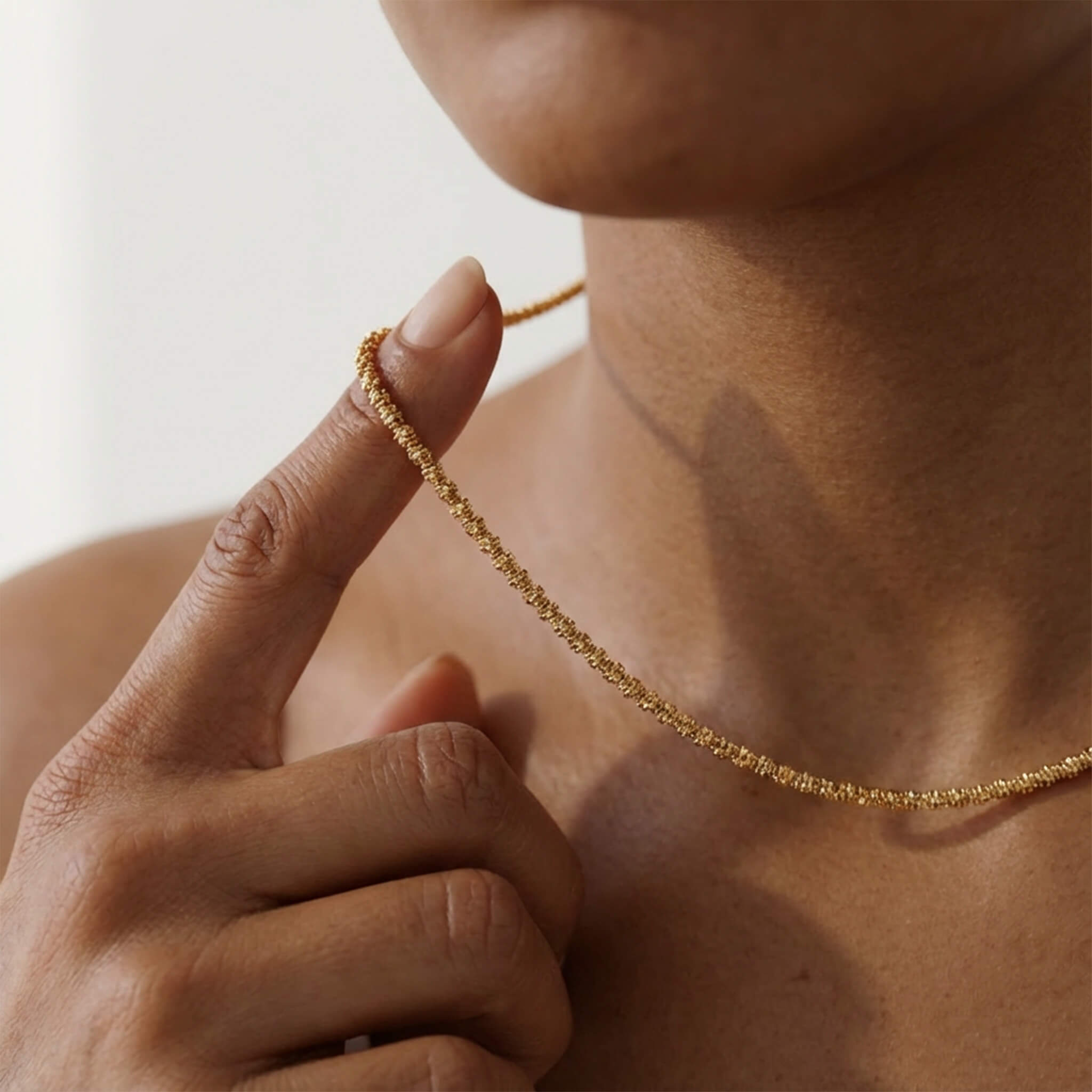 Rooted Rope Chain Necklace, close-up of the gold rope chain texture