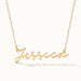 Signature Name Necklace – name "Jessica" in script hanging on a fine chain, closer view, gold, on ivory background