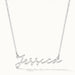 Signature Name Necklace – name "Jessica" in script hanging on a fine chain, silver, on ivory background