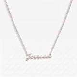Signature Name Necklace in silver spelling Jessica, flat lay on white background