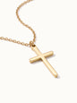 Steadfast Cross Necklace in gold, lying flat