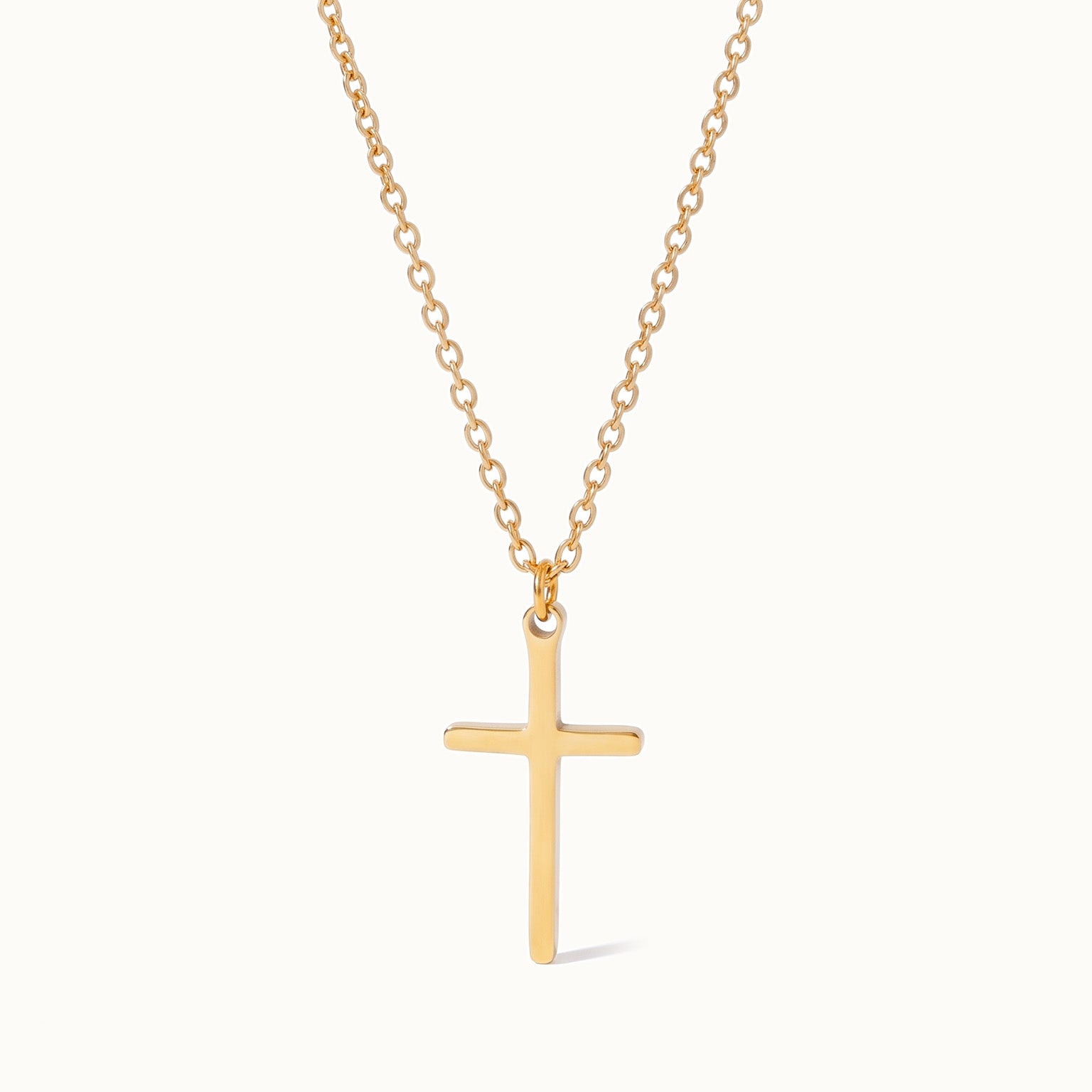 Steadfast Cross Necklace in gold, long drop