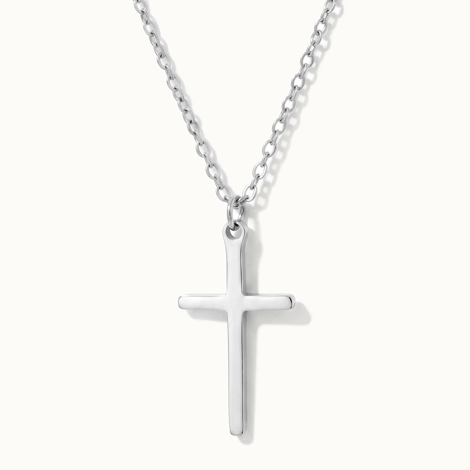 Steadfast Cross Necklace in silver, close-up of the cross
